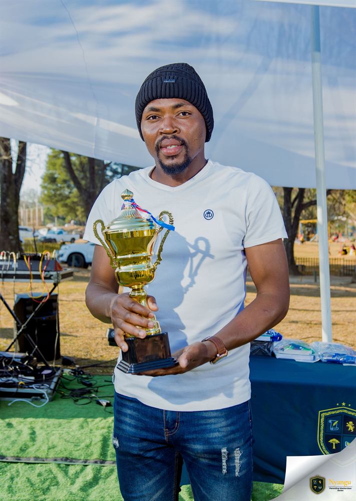 The Nyangu Literacy Award of the Year trophy held up on the festival grounds